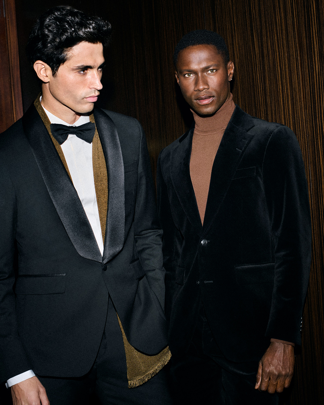 Man in tuxedo and man in velvet black suit